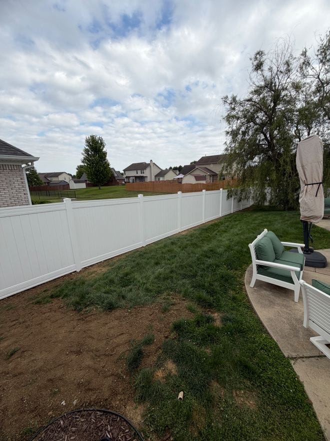 White vinyl privacy fence